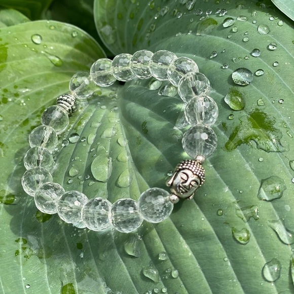 Faceted clear Quartz and silver tone pewter Buddha charm bracelet